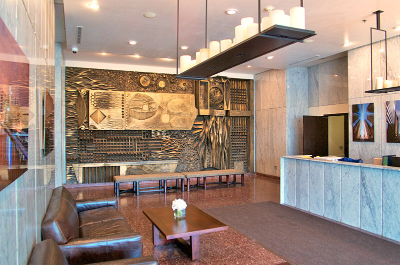 A photo of the lobby of the Metroclub condominium building.